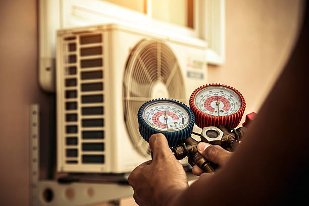 Professional Hvac technician working in Caledonia, MI